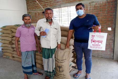 মধুখালীতে ১০ টাকা দরে চাল বিতরন