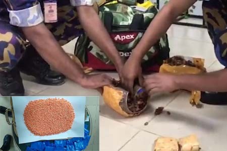 বিমানবন্দরে তেঁতুলের আচারের বয়ামে ৯ হাজার ৮৮৫ পিস ইয়াবা