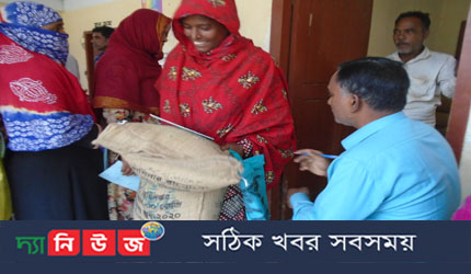 মধুখালীতে ভি.জি.ডি চাল বিতরন
