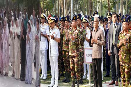 কবরস্থানে পুষ্পস্তবক অর্পণ